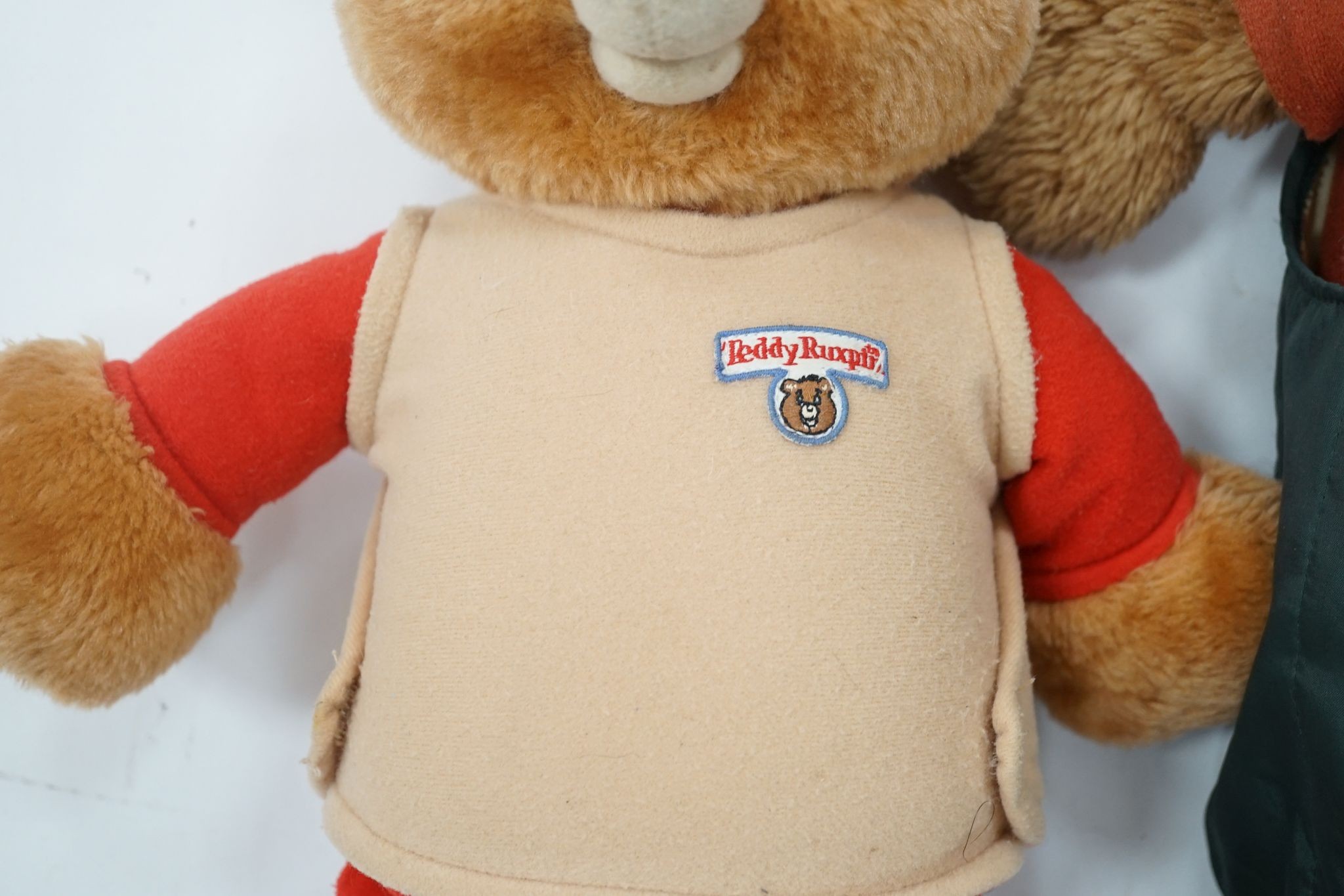 A Teddy Ruxpin 1950's, good condition, Musical Play Tapes Animatronic, has box, literature and tapes, together with another unboxed, no tapes